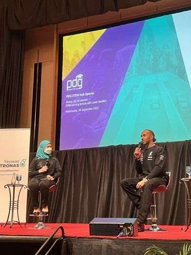 Shariah Nelly Francis, CEO of Yayasan PETRONAS moderating a Q&A session with Lewis Hamilton, seven-time world champion Mercedes-AMG PETRONAS Formula One driver.